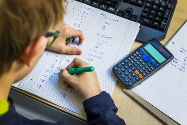 A child doing maths work to represent 11 Plus Maths Tutoring Harrow, Brent & Barnet